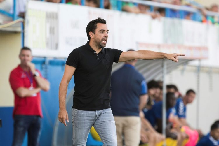 Foto de Xavi como treinador no Catar